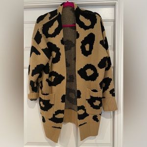 Women’s leopard sweater. Brand new.